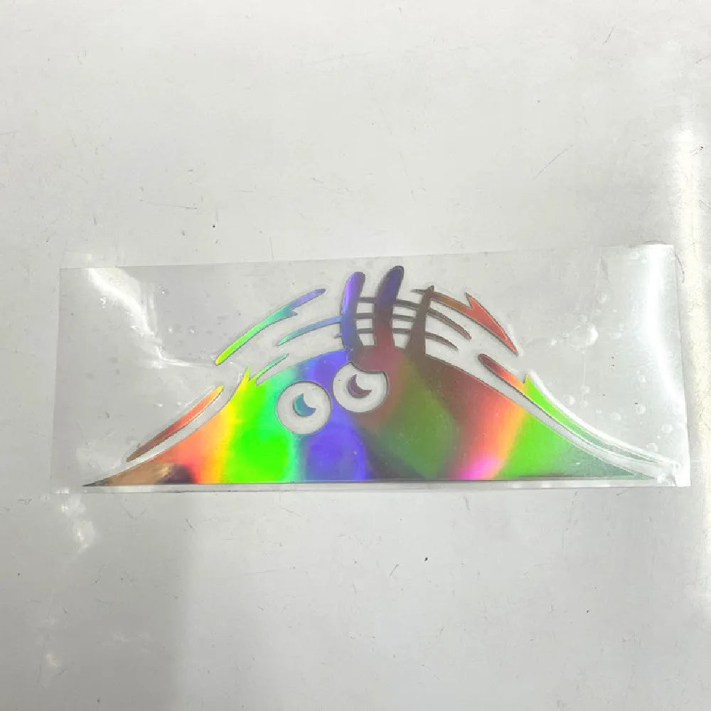 Self-adhesive body sticker in 19cm x 7cm size with facial expression design