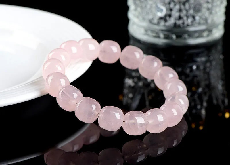 Pink natural bamboo crystal barrel bead bracelet with 11-12mm geometric beads