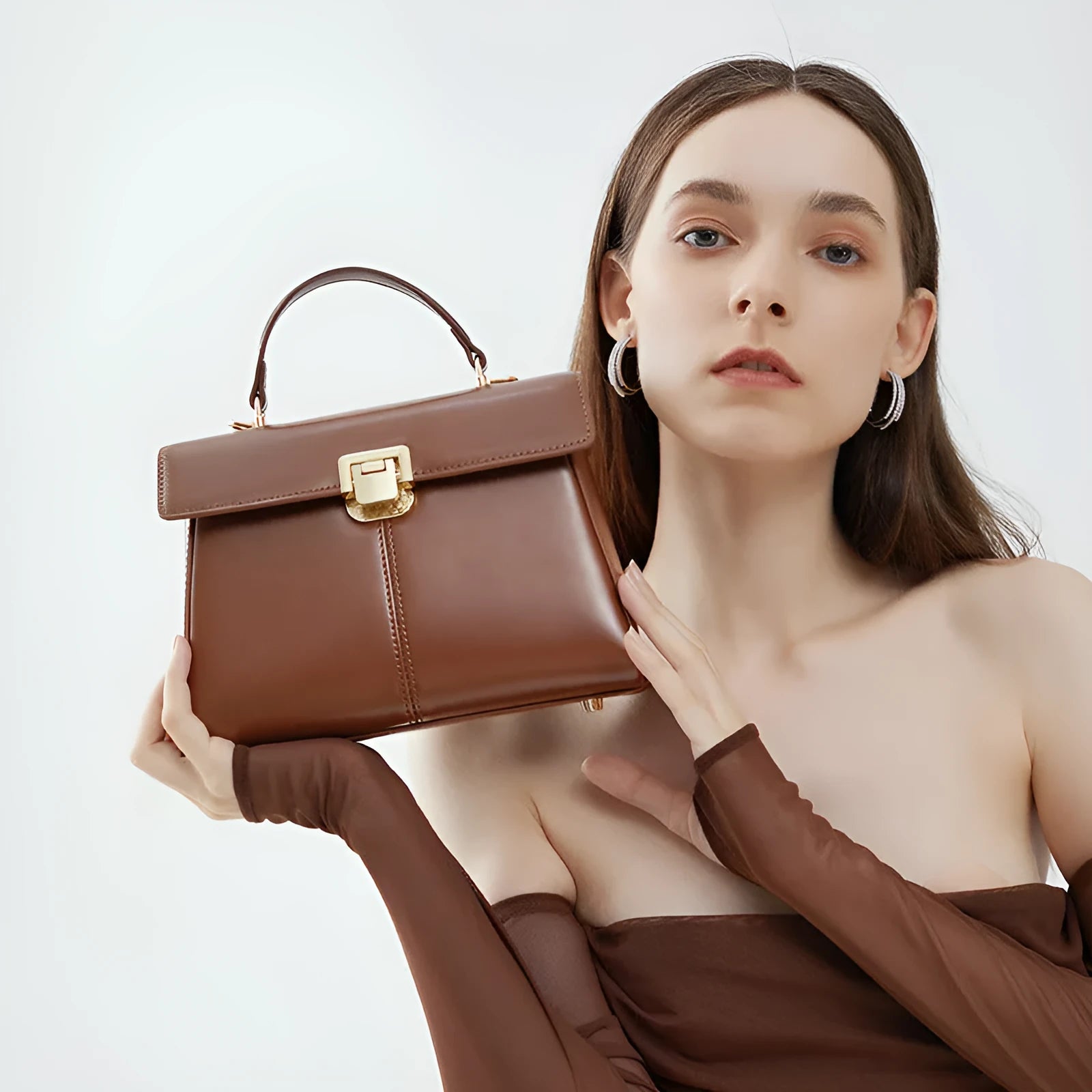 Women's genuine leather shoulder bag in horizontal square design with cover opening