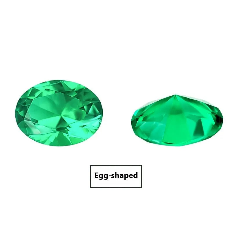Loose cultivated emerald gemstone in Columbia green treasure colour on a white background.