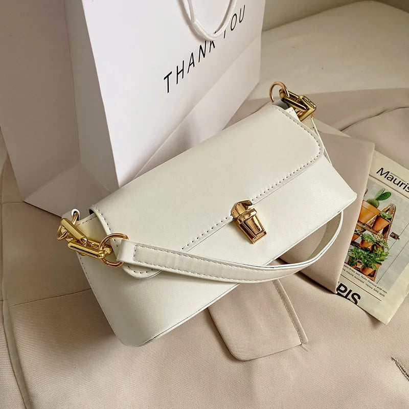 Brown PU leather underarm shoulder bag with square shape, sandwich pocket front and adjustable shoulder chain