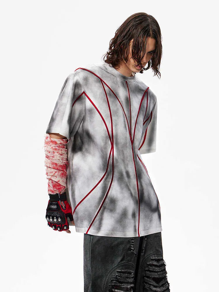 Women's padded shoulder t-shirt with three-dimensional line patchwork design on front