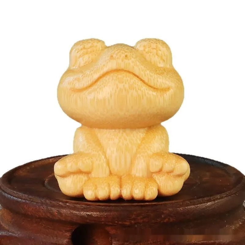 Solid bamboo smiling frog carving ornament with cartoon cute style measuring 5cm tall