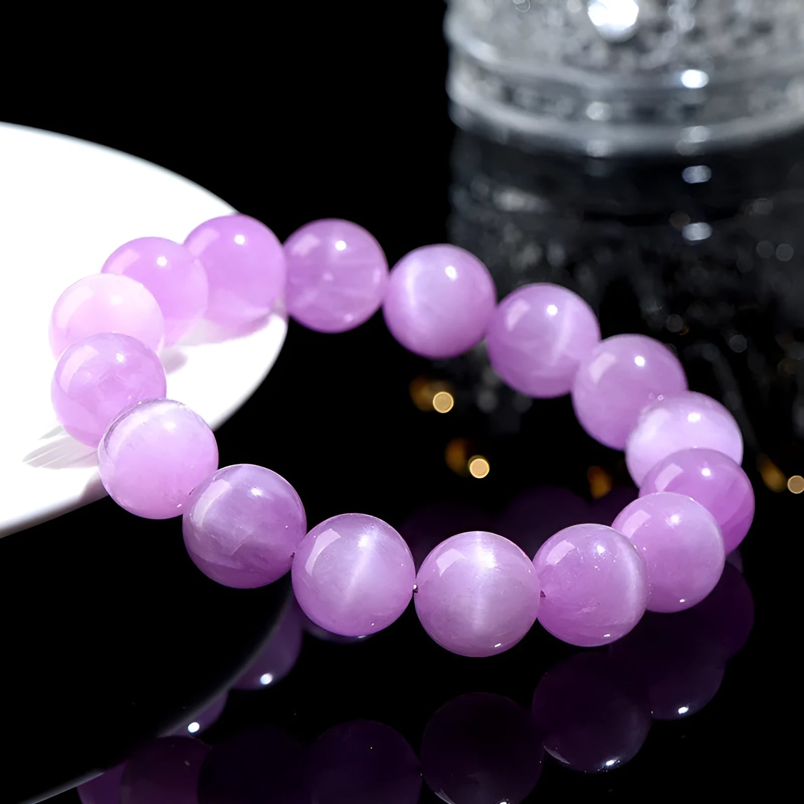 Natural cat's eye spodumene purple bracelet with waxy polished geometric beads