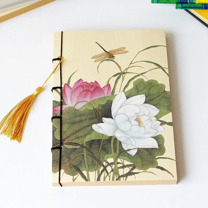 A5 antique thread-bound notebook with embossed cover and decorative tassels