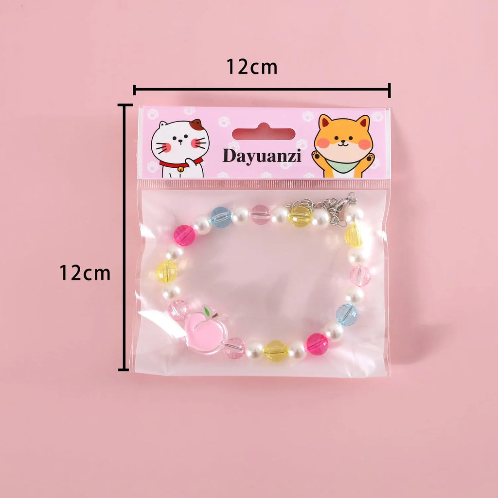 Colourful plastic pearl bead pet necklace with small flower pattern on adjustable strap