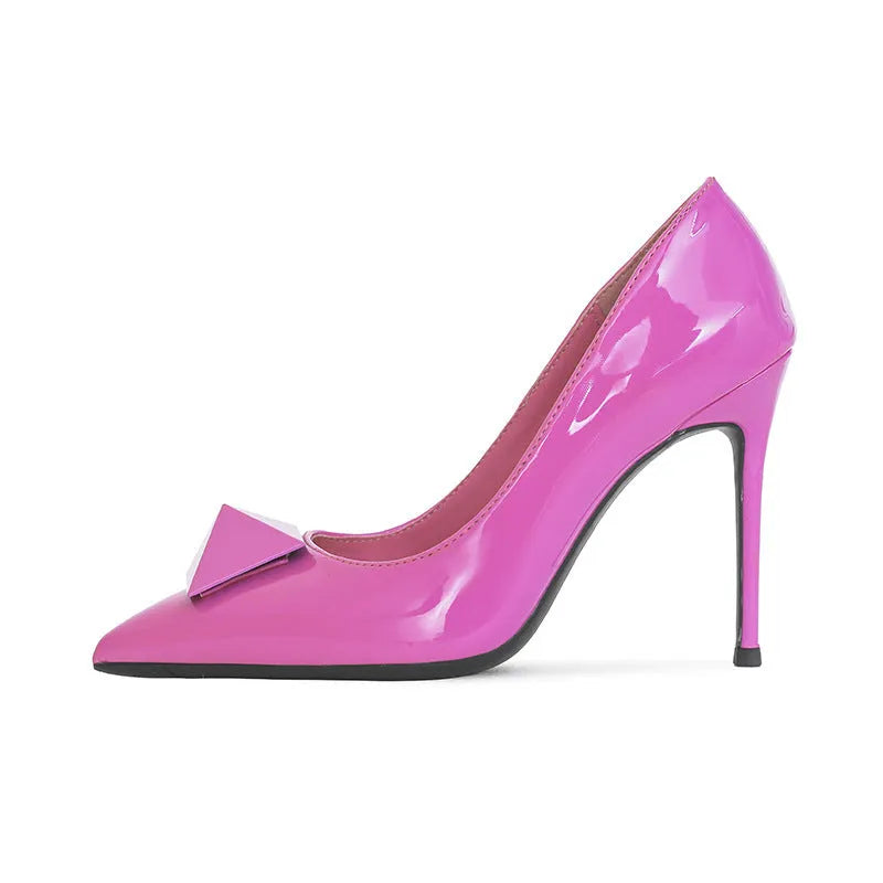Pink patent leather women's stiletto high heels with pointed toe and buckle detail on a rubber sole.