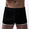 Men's breathable cotton blend three-point boxer shorts in black, shown flat.