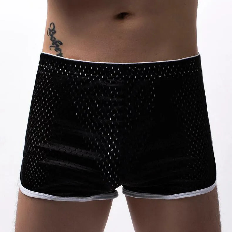 Men's breathable cotton blend three-point boxer shorts in black, shown flat.