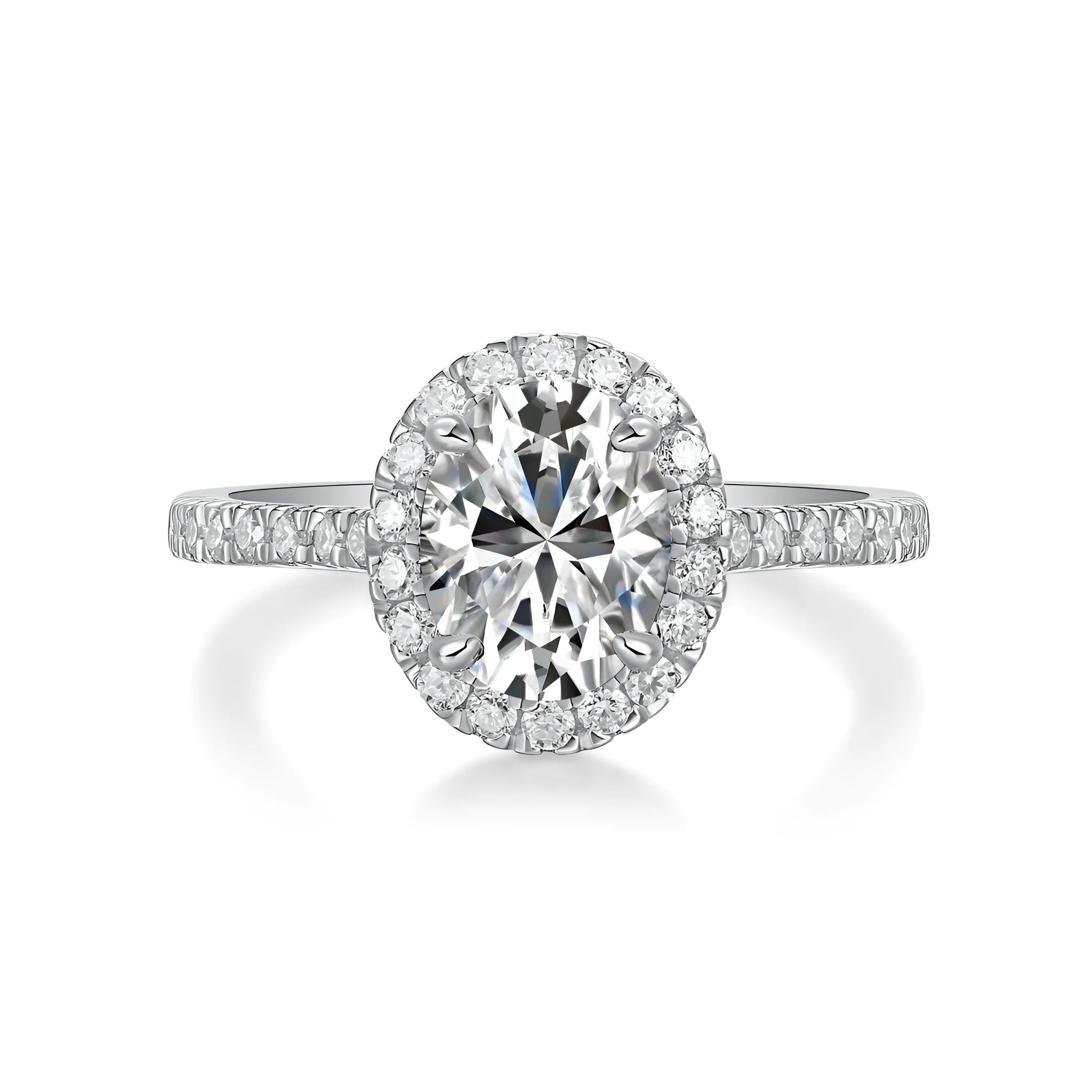 Egg-shaped 7x9mm moissanite wedding ring in S925 silver with platinum plating on white background