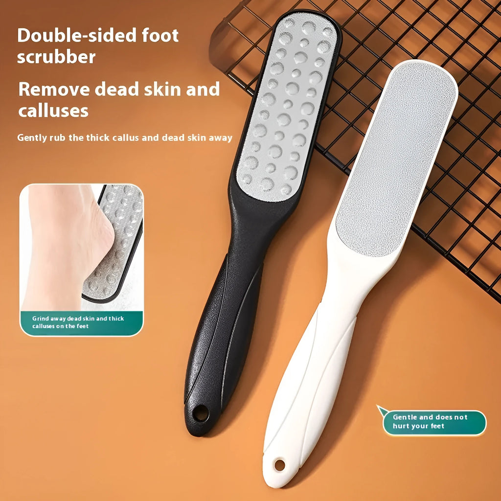 Double-sided stainless steel foot grinder with black and white abrasive pads for foot care