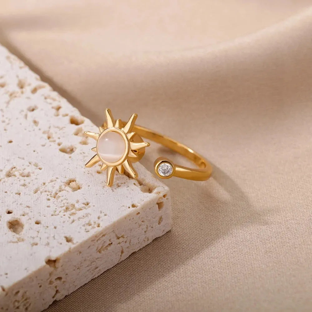 Gold electroplated copper rotatable decompression ring with geometric design and adjustable opening