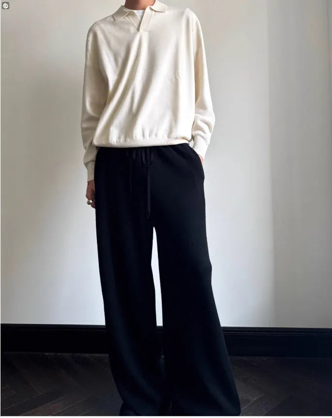 Old Money style pure wool polo sweater with lapel collar in loose fit, shown in navy blue colour.