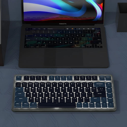 Ajazz AK832PRO green three-mode mechanical keyboard with colour screen on a desk.
