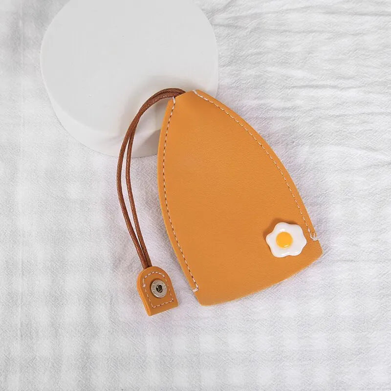 Cartoon design pull-out key case for car keys in PU leather.