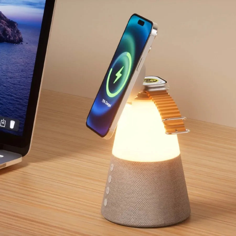Grey 3-in-1 magnetic wireless charging Bluetooth speaker night light on a tabletop