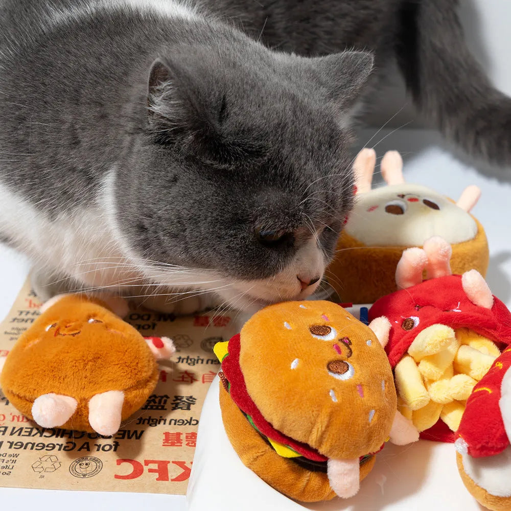 Set of five soft cat chew toys shaped like a hamburger, chicken leg, fries, bread, and hot dog for teething kittens.