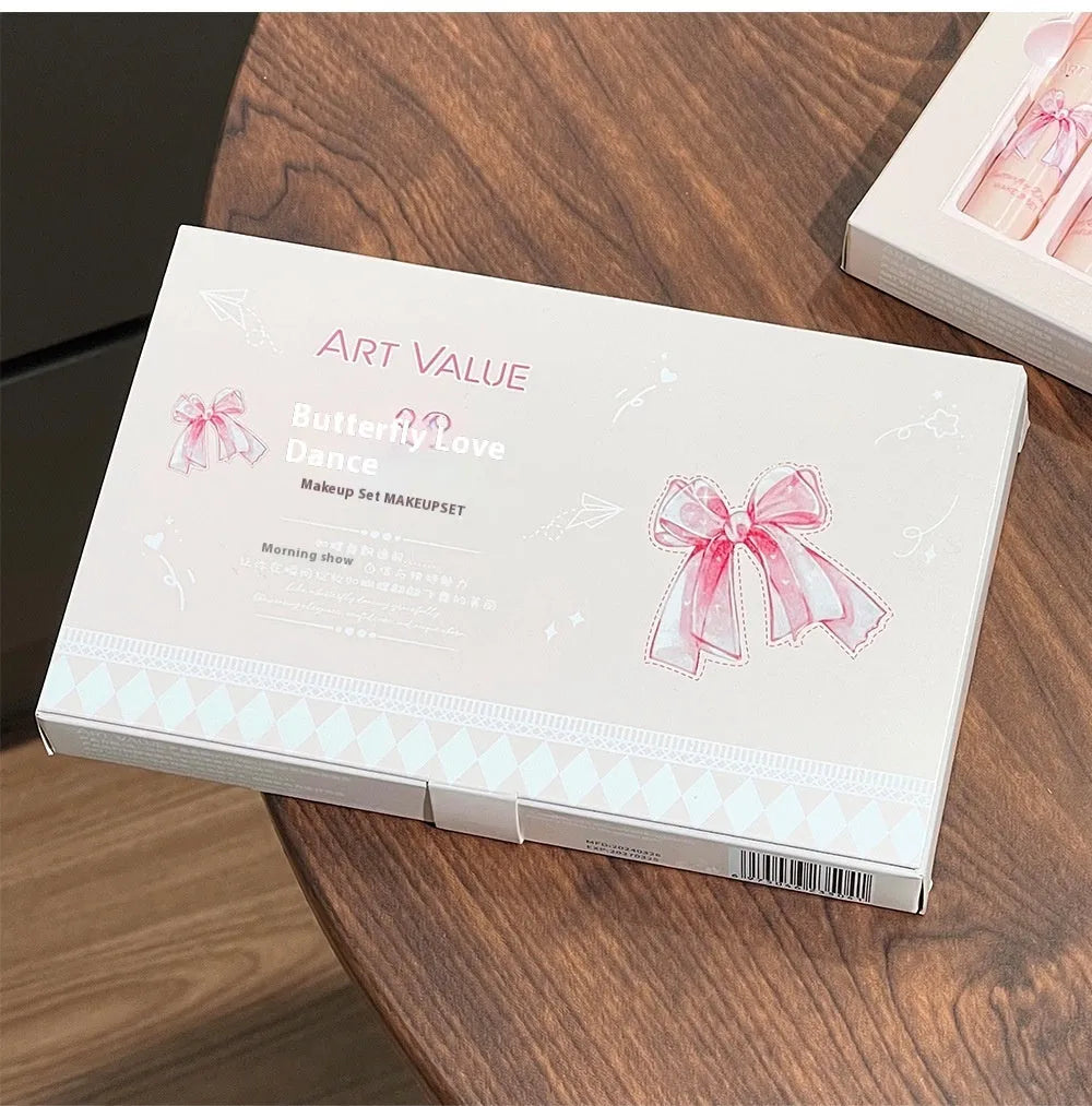 Butterfly Box Suite makeup set with pink lip muds, blush, and necklace