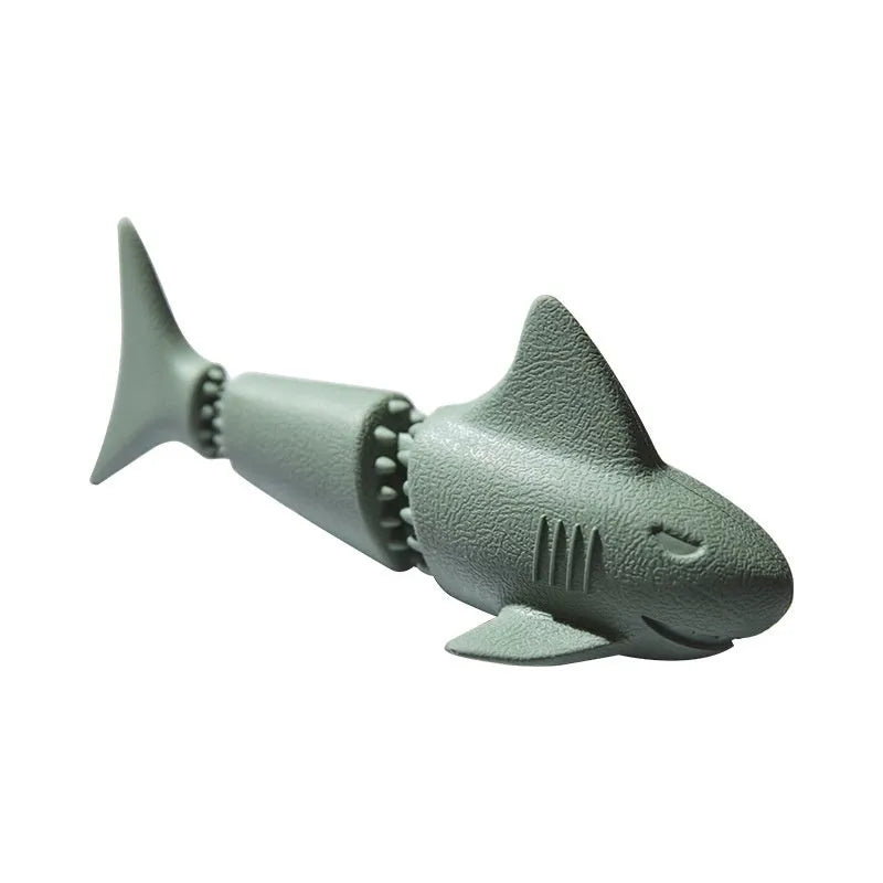 Blue rubber shark dog chew toy on a white background
