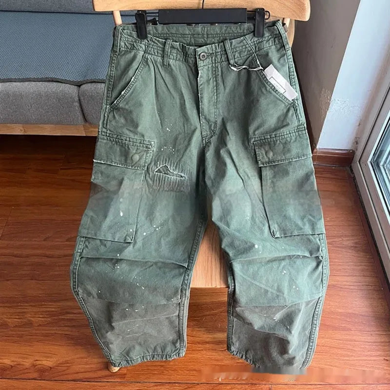 Men's loose cotton paratrooper trousers in Army Green with mid rise zipper fly