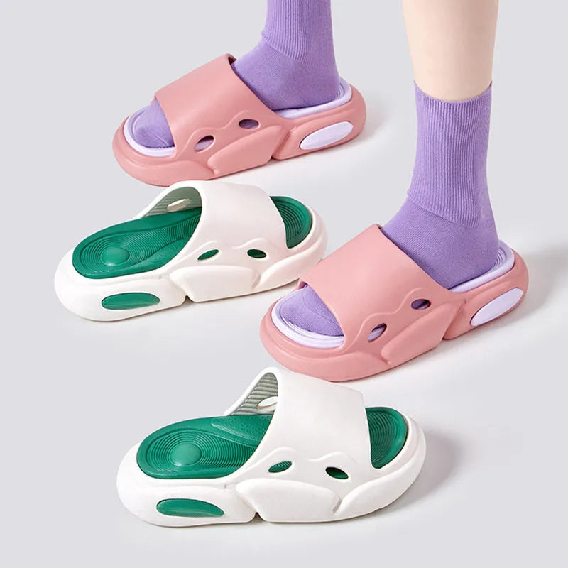 A pair of unisex EVA foam slippers with a thick sole and leather lining, shown in a two-colour design.