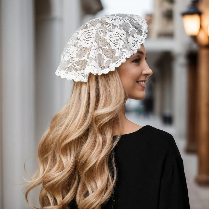 Round white bridal head cover with floral decoration measuring 30cm