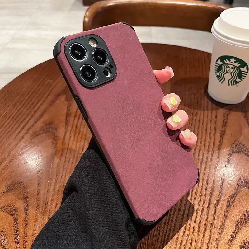 Simple solid colour fur phone case with imitation leather texture for iPhone fall prevention, available in black, blue, and green