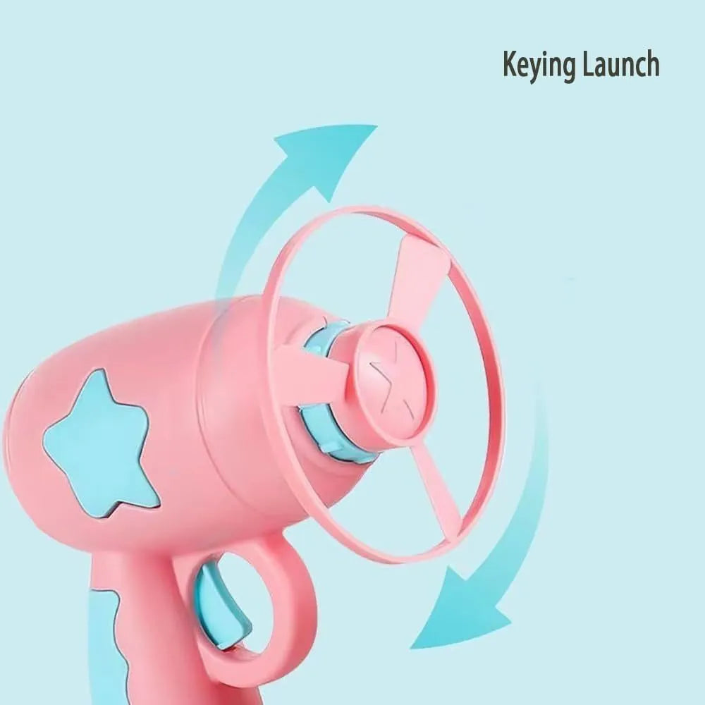 Blue interactive cat toy gun with plastic Frisbee mounted on launch mechanism