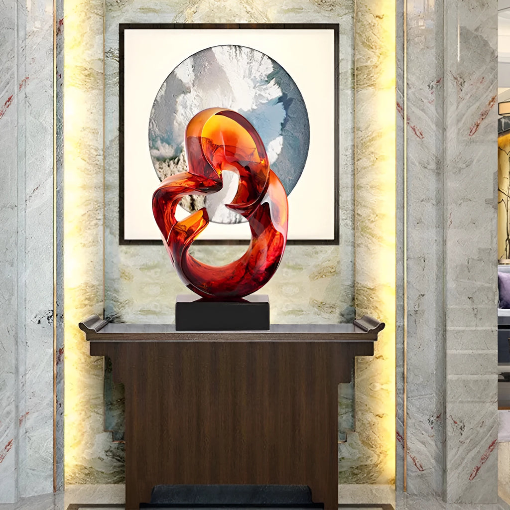 Transparent resin sculpture ornament in modern simplicity style showing orange red or blue colour options
