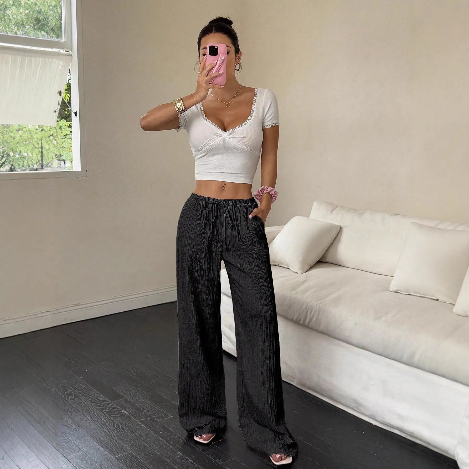 Women's wide leg trousers with lace-up waist trimming detail in polyester fabric