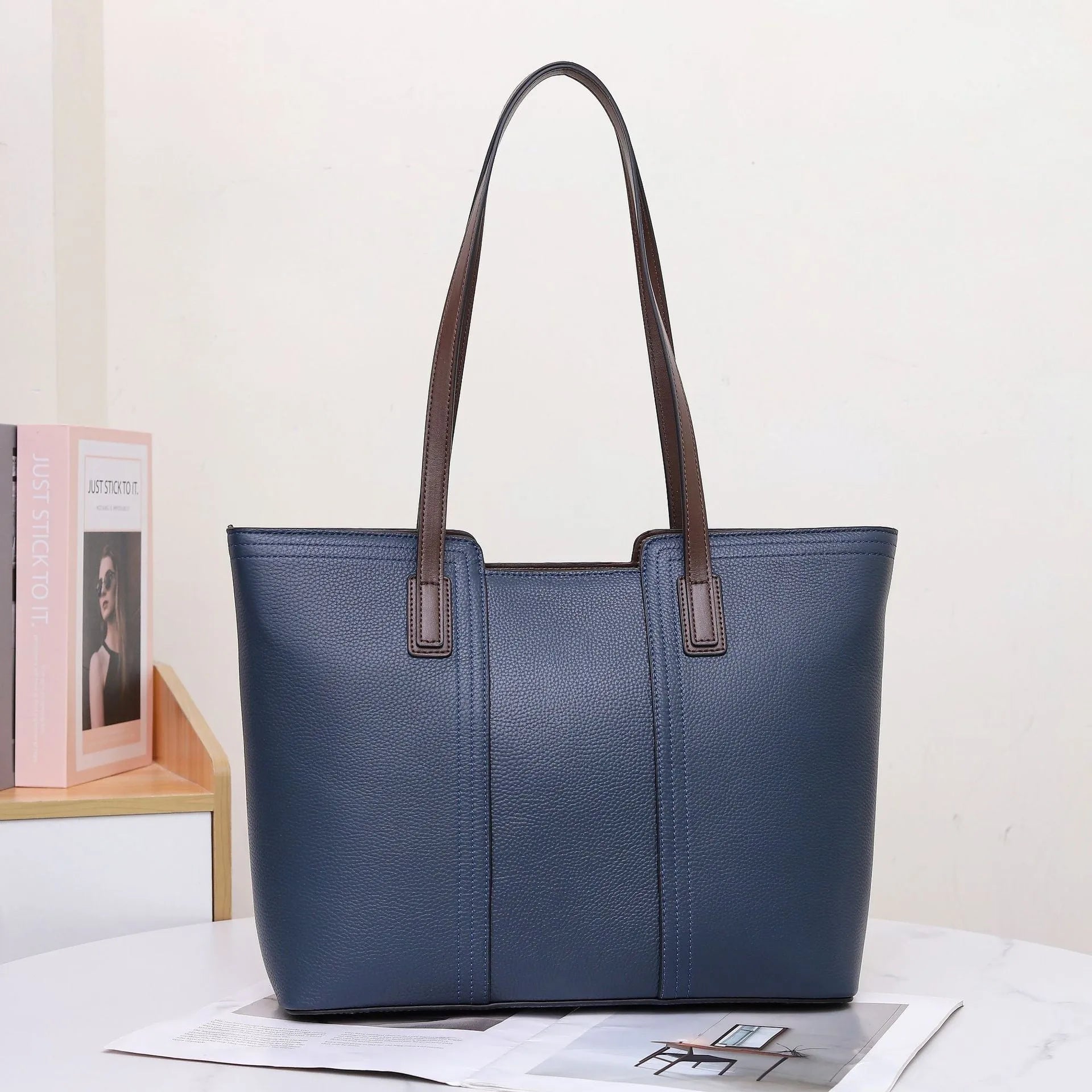Genuine leather women's commuter shoulder bag with box-shaped design and urban simplicity styling