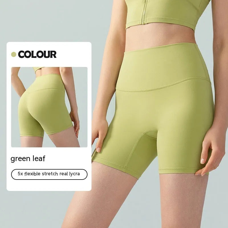 Women's high-waisted Lycra yoga shorts in leaf green with four-point cycling construction
