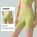 Women's high-waisted Lycra yoga shorts in leaf green with four-point cycling construction