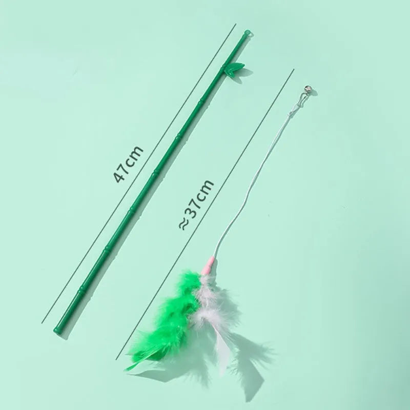 Green interactive cat feather wand toy with bells for play and training