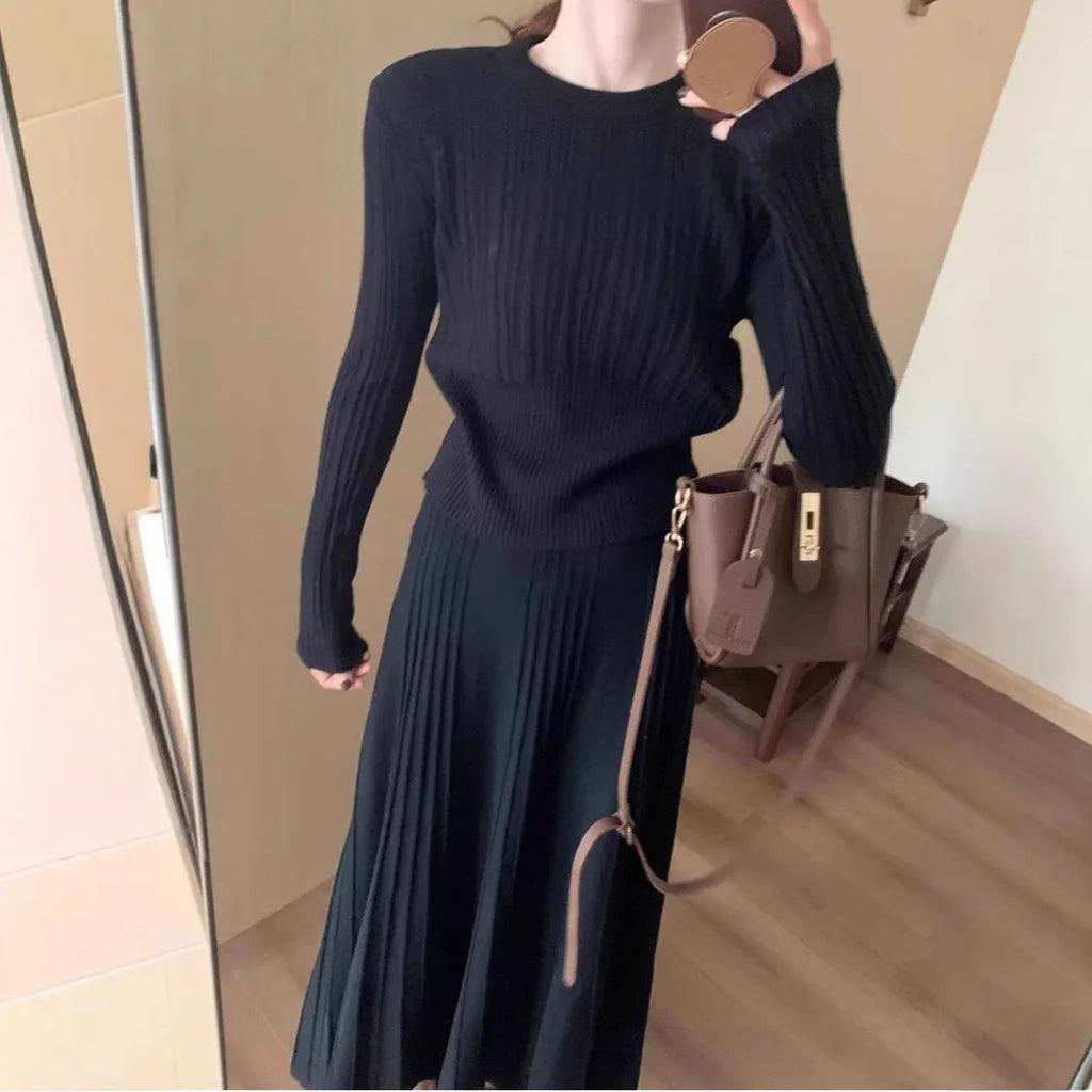 Dark grey knitted sweater and skirt suit set with artistic retro 3D pattern.