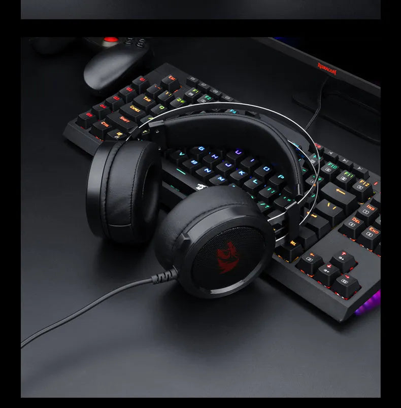 Black wired computer gaming headset with a long cable and a 3.5mm plug.