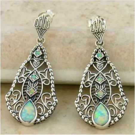Women's antique silver alloy earrings with retro snake motif, 5 cm length, suitable for pierced ears