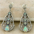 Women's antique silver alloy earrings with retro snake motif, 5 cm length, suitable for pierced ears