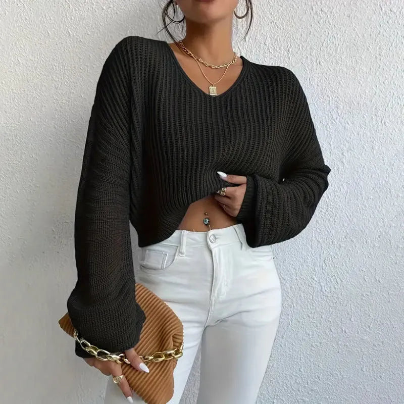 Solid colour women's long sleeve pullover in polyester fabric with thread detail