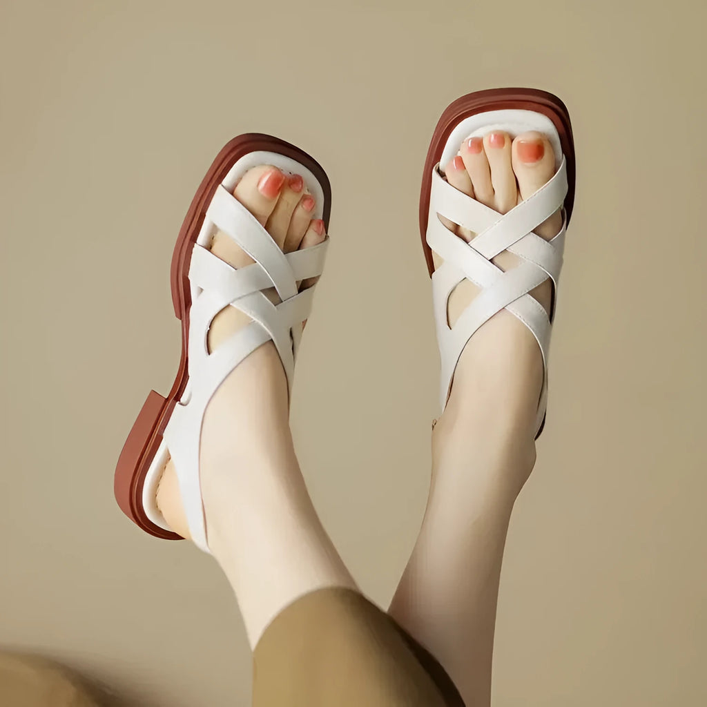 Women's patent leather square toe beach sandals with cross straps in black, brown, and off-white colours.
