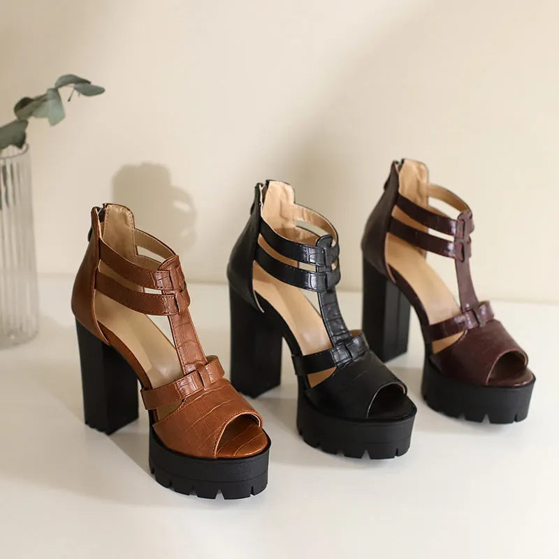Women's platform high heel sandal in black with a round toe and a back zipper closure.