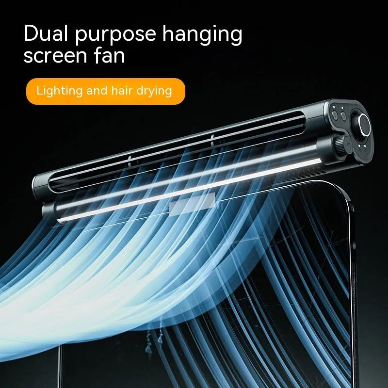 Black USB-powered bladeless fan with clip mount attached to laptop screen showing integrated lighting