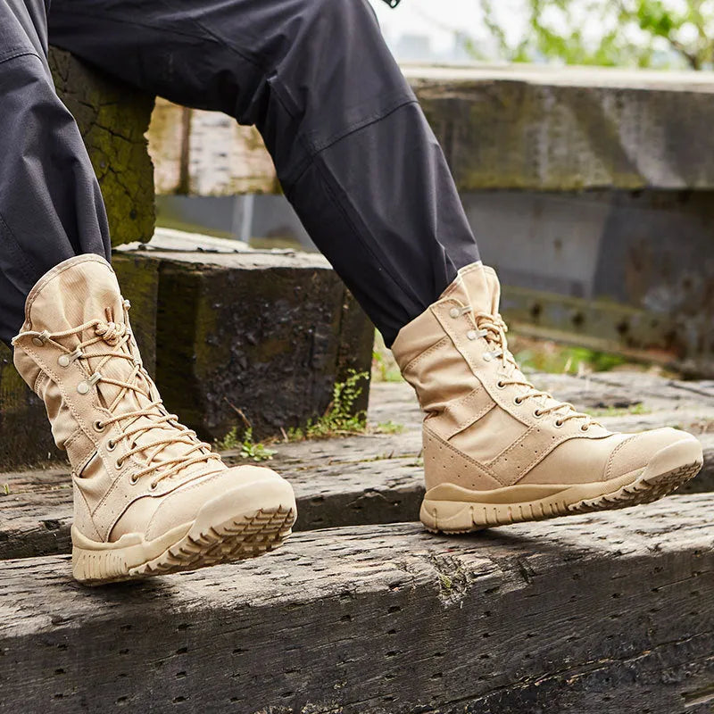 Yulong summer tactical desert combat boots in black and sand colour, shown on a rocky outdoor surface.
