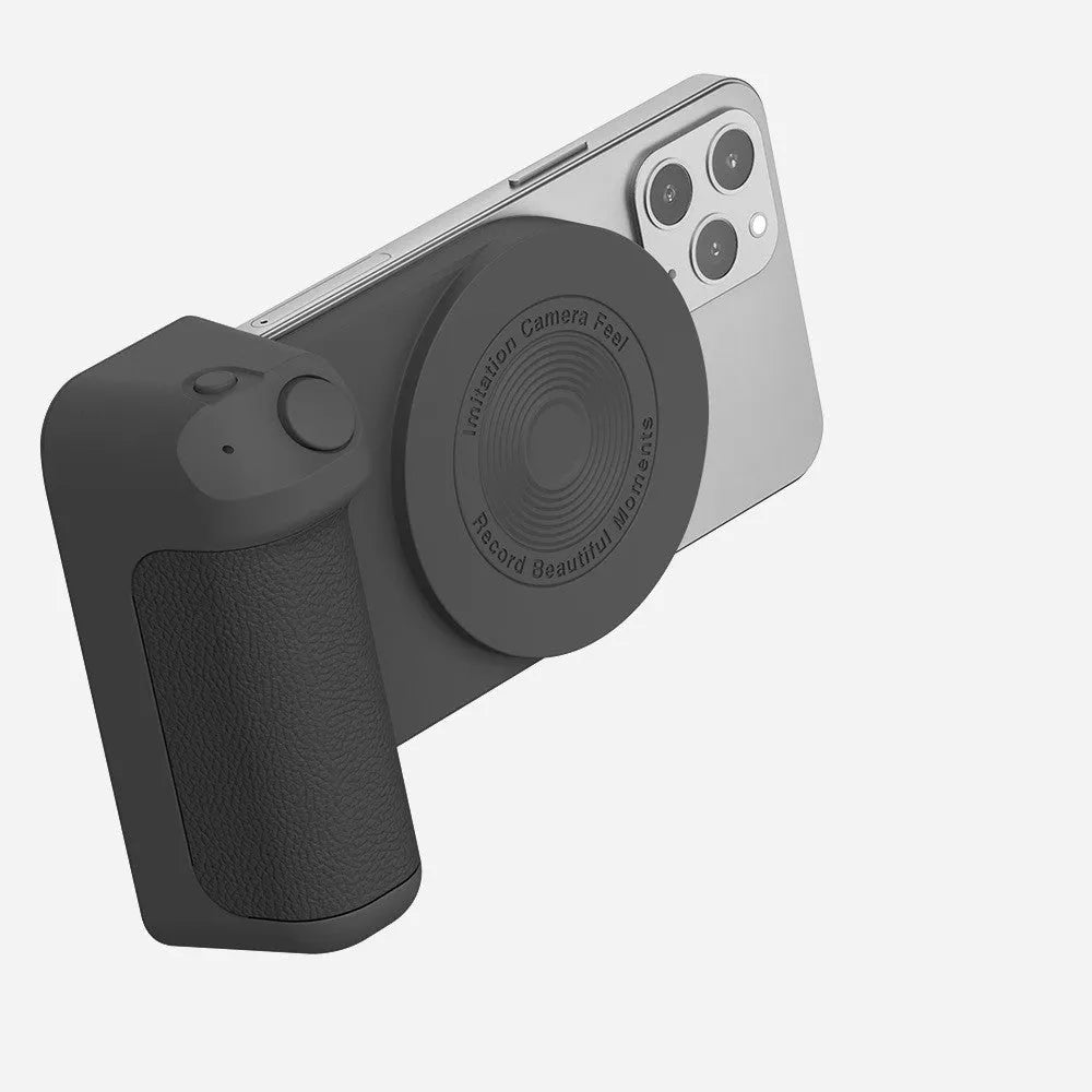 Black magnetic phone camera handle with rotatable design and PU leather grip on wooden table