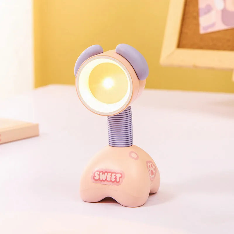 DIY cartoon magnetic small night lamp in assorted animal styles and colours on a desktop.