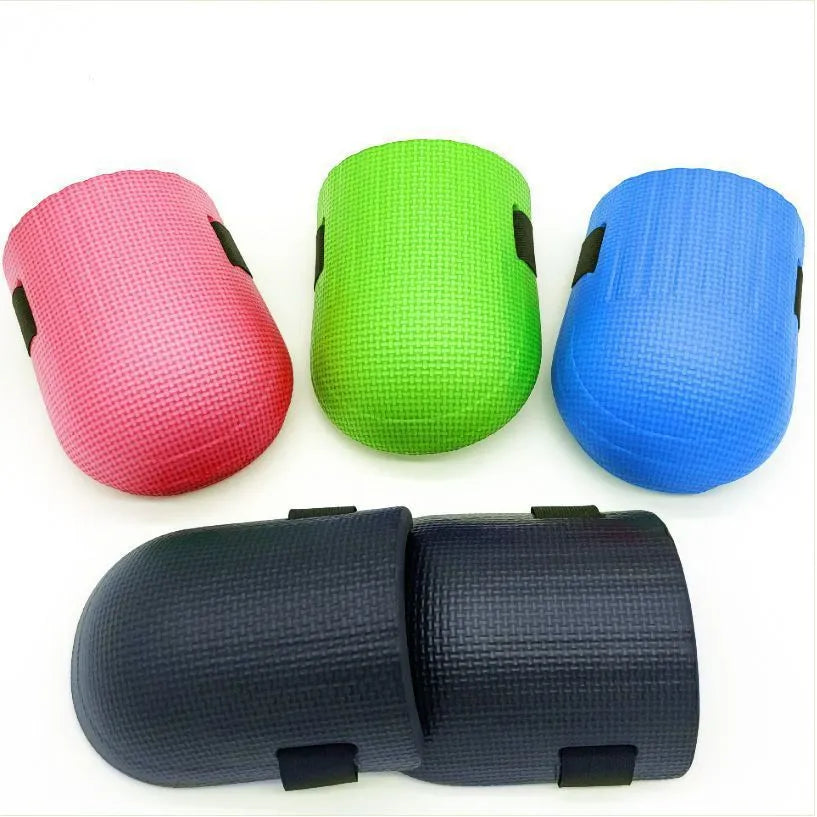 A pair of EVA foam kneepads in assorted colours for construction and DIY work.