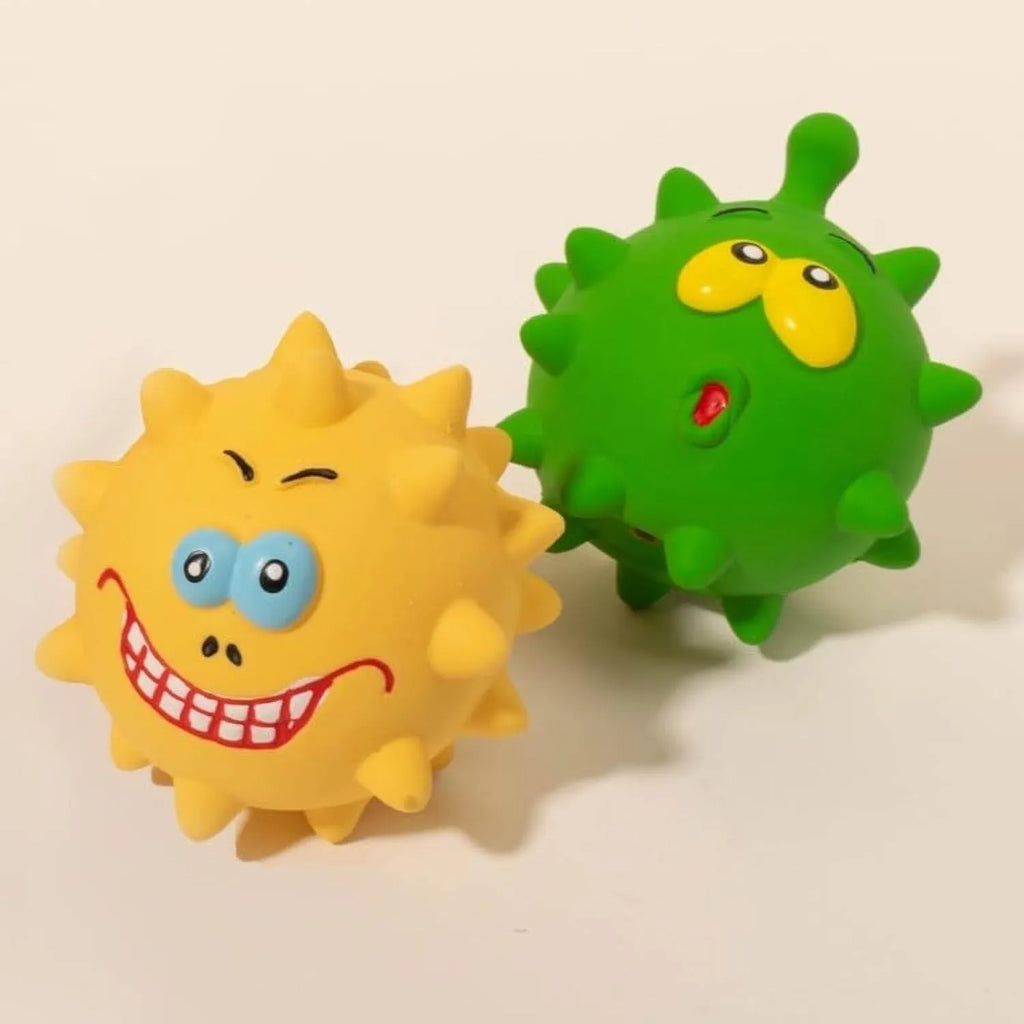 Four colourful latex squeaky dog balls with bumpy texture and cute faces for dental cleaning during play