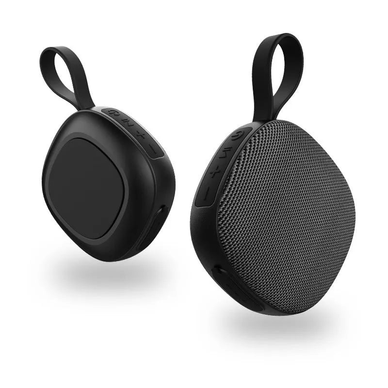 Wireless Bluetooth mini speaker with fabric waterproof cover and magnetic suction, available in black or white shell with grey or green cloth net