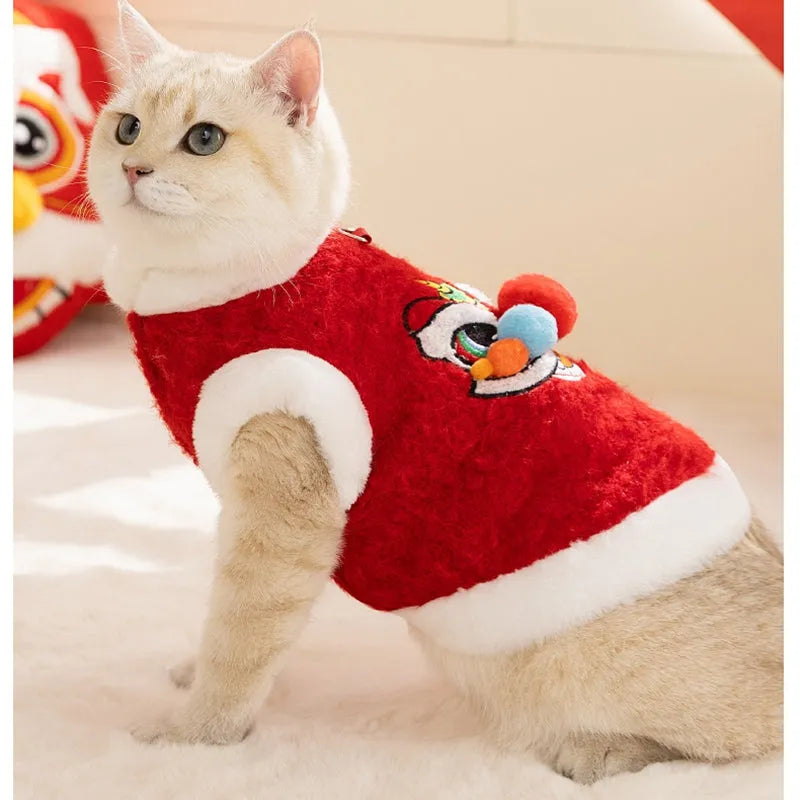 Red cotton-padded 3D lion dance pet vest with faux fur trim for small dogs and cats, featuring embellished eyes and pom-poms.