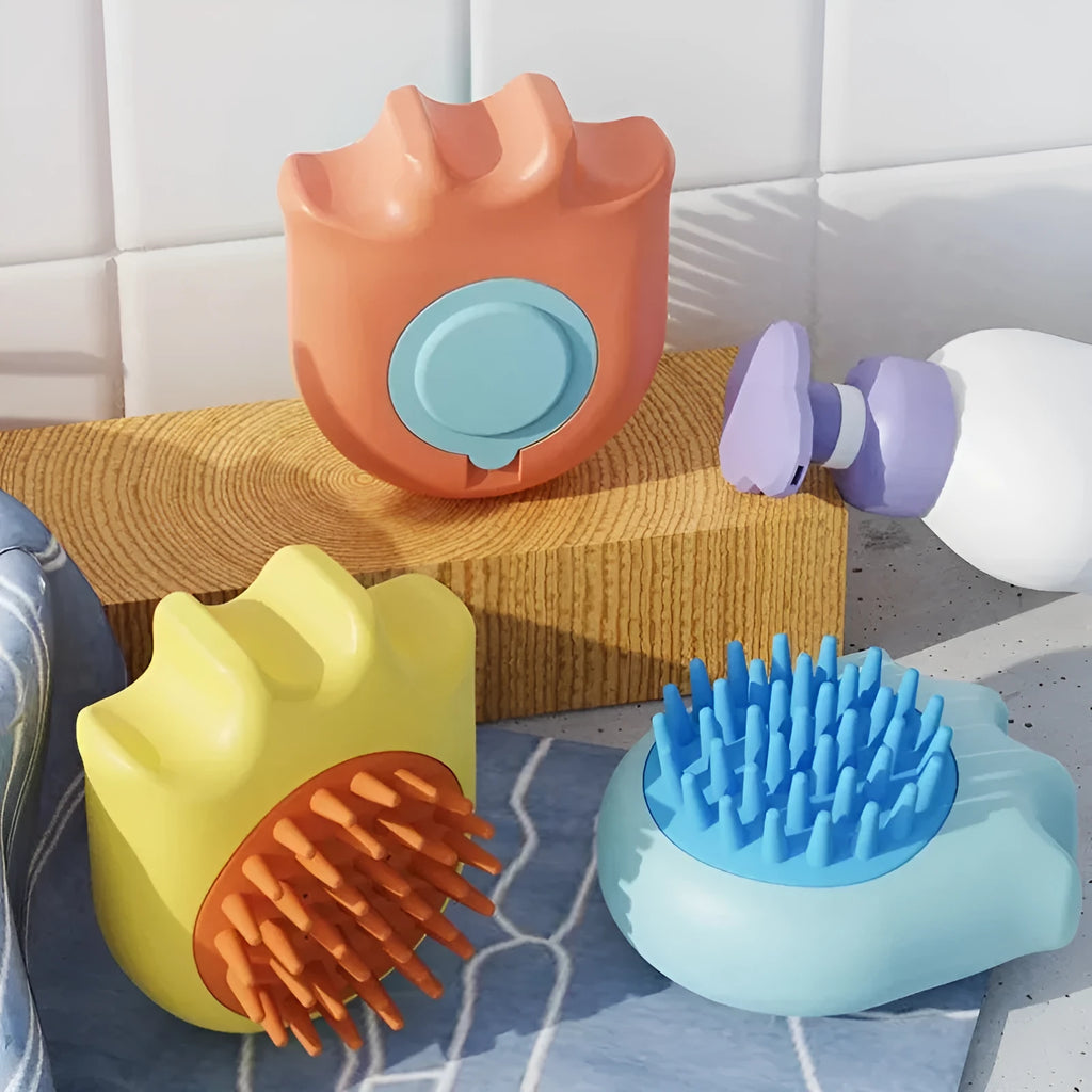Four pet bath brushes with integrated shampoo boxes in blue, orange, and yellow colours for cat and dog washing